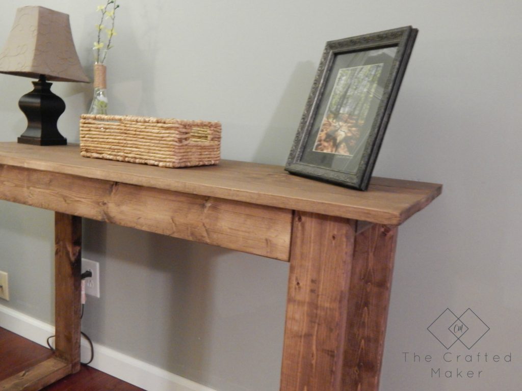 Come check out how to build this $25 console table with very little supplies needed. Free PDF plans included along with a step by step build with pictures.