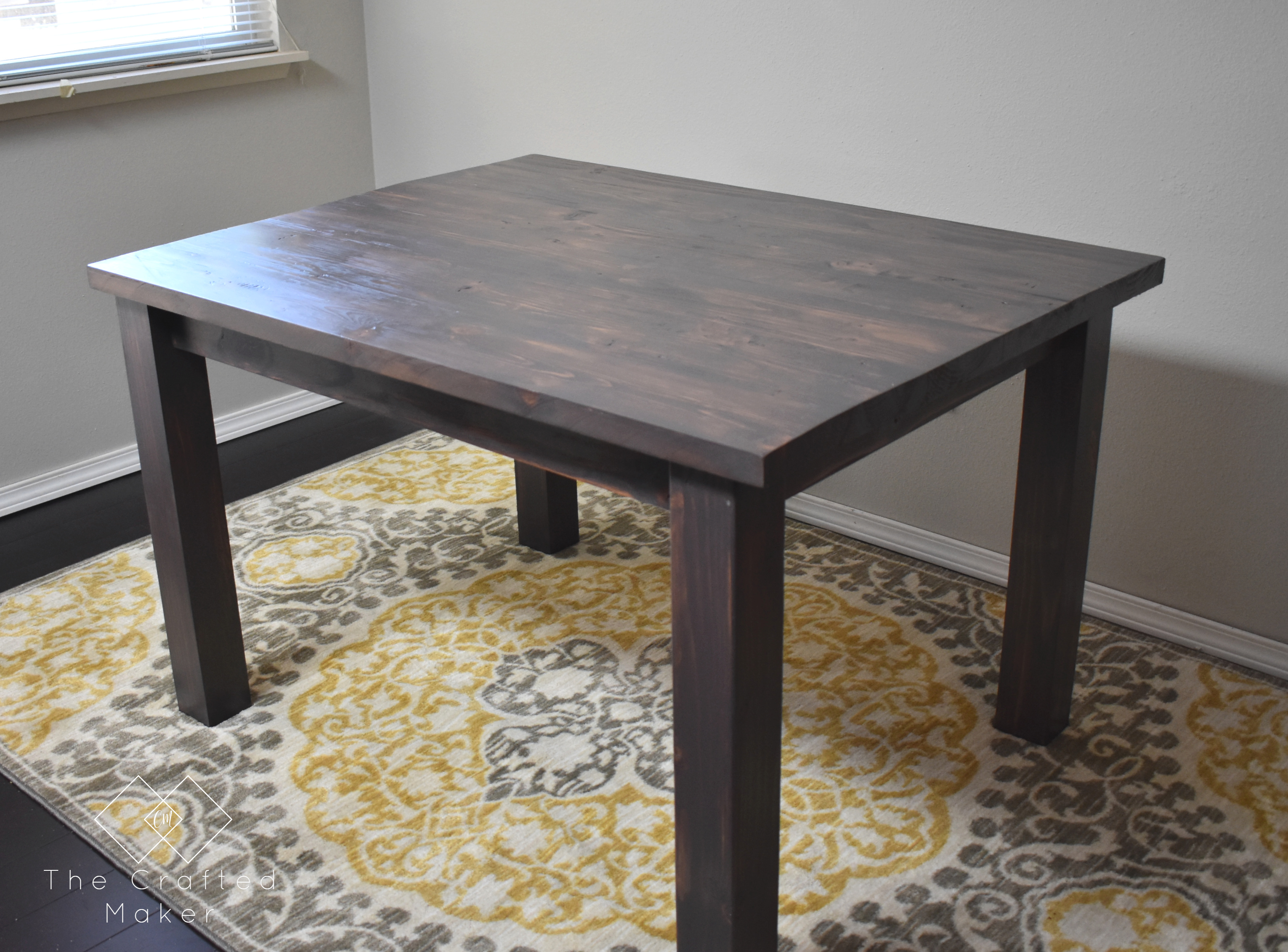 Build this modern farmhouse dining table for your next gathering. This table is perfect for smaller dining rooms or breakfast nooks.