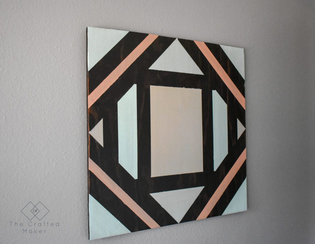 Make this fun geometric scrap wood wall art with scrap wood and paint you already have on hand. This is a quick, colorful, and creative afternoon project!