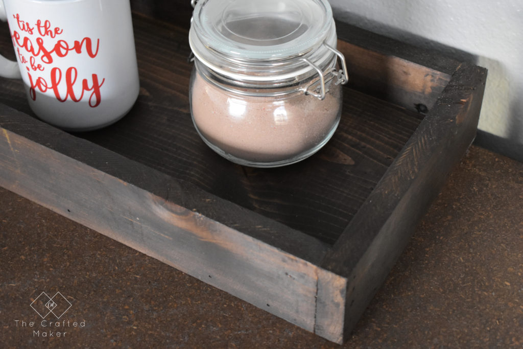 A wooden tray is a staple in home decor. It not only looks good mixed in with decor but serves a purpose too! Build this simple wooden try in about an hour.