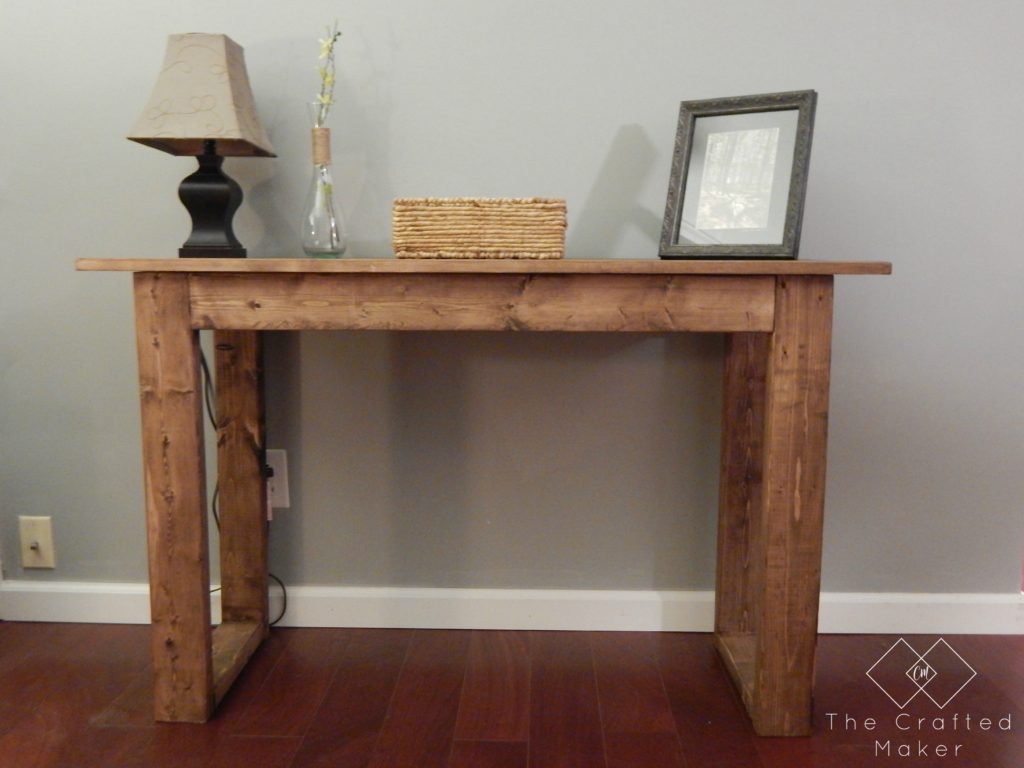 Come check out how to build this $25 console table with very little supplies needed. Free PDF plans included along with a step by step build with pictures.