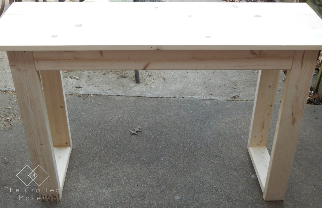 Come check out how to build this $25 console table with very little supplies needed. Free PDF plans included along with a step by step build with pictures.