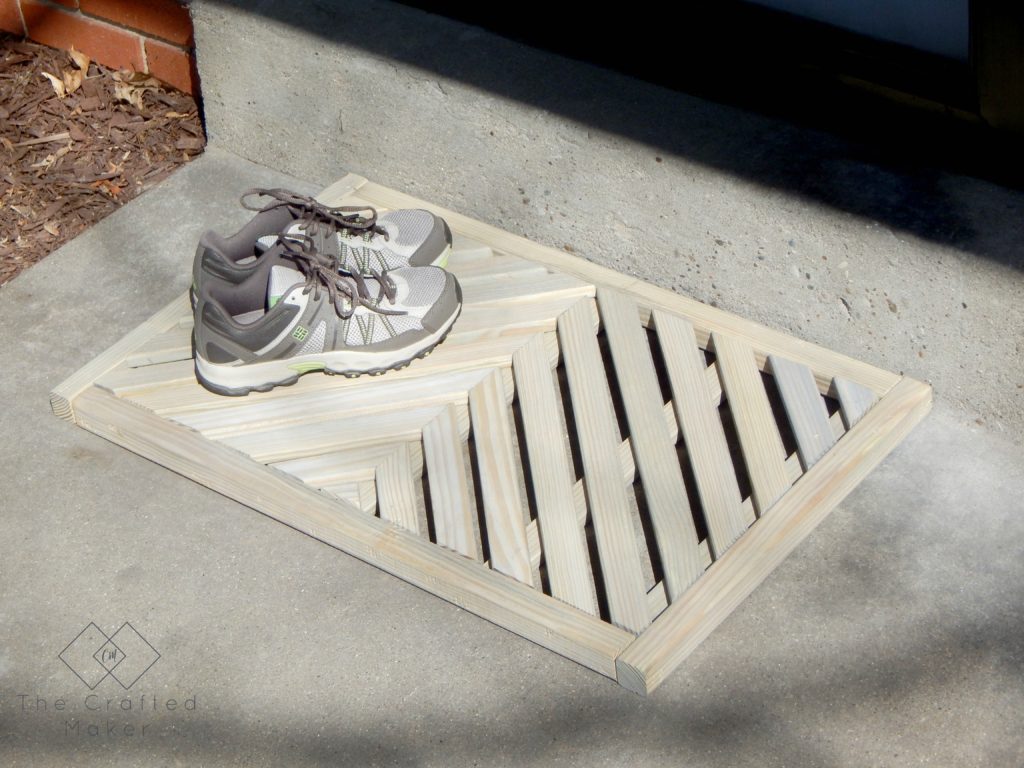 If you have ever wanted to make your own DIY wooden doormat, this is for you. With just a few boards, give your front porch a makeover.